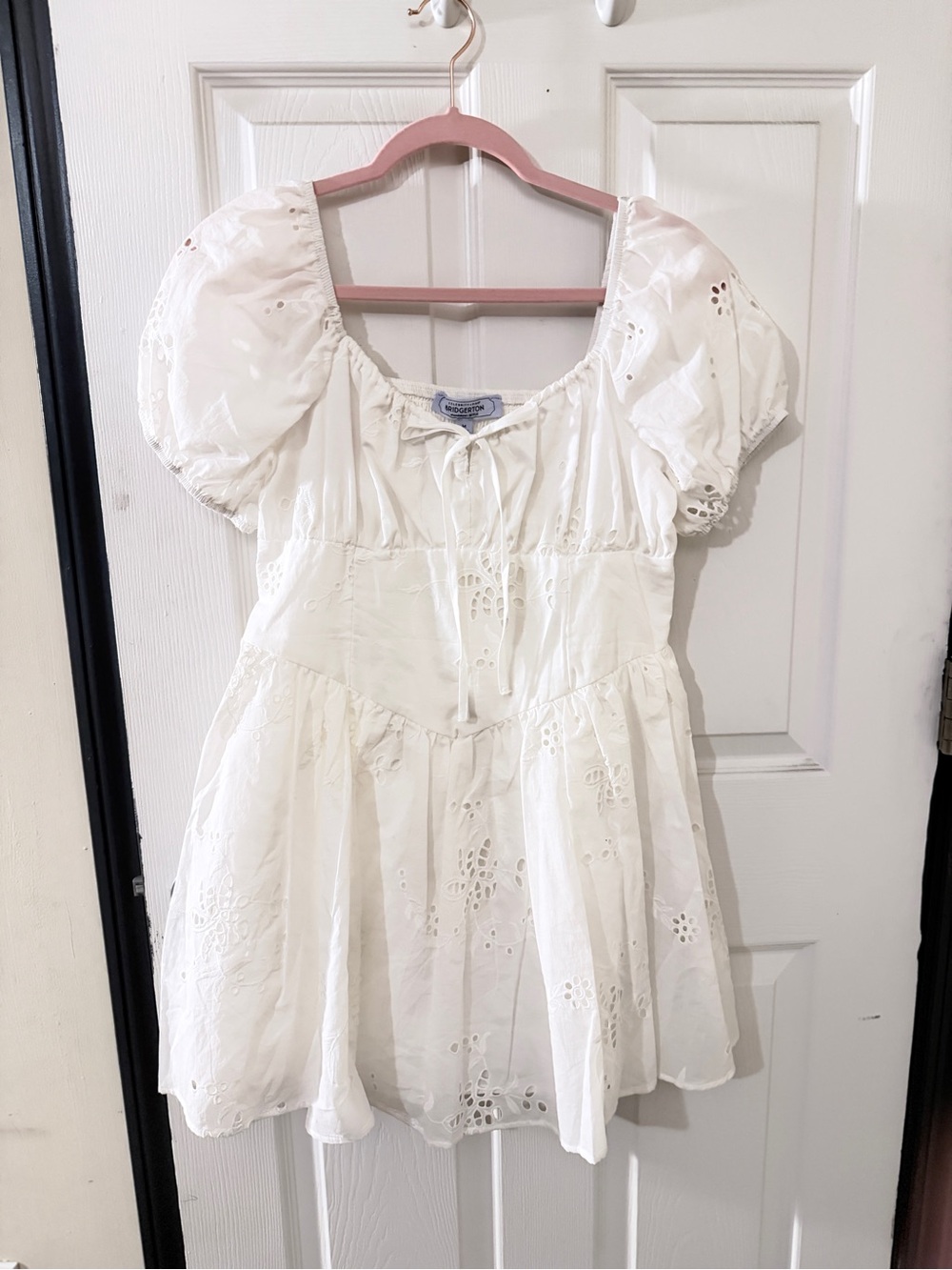 Celebrity Pink Cream Ruffled Neckline Mini Dress